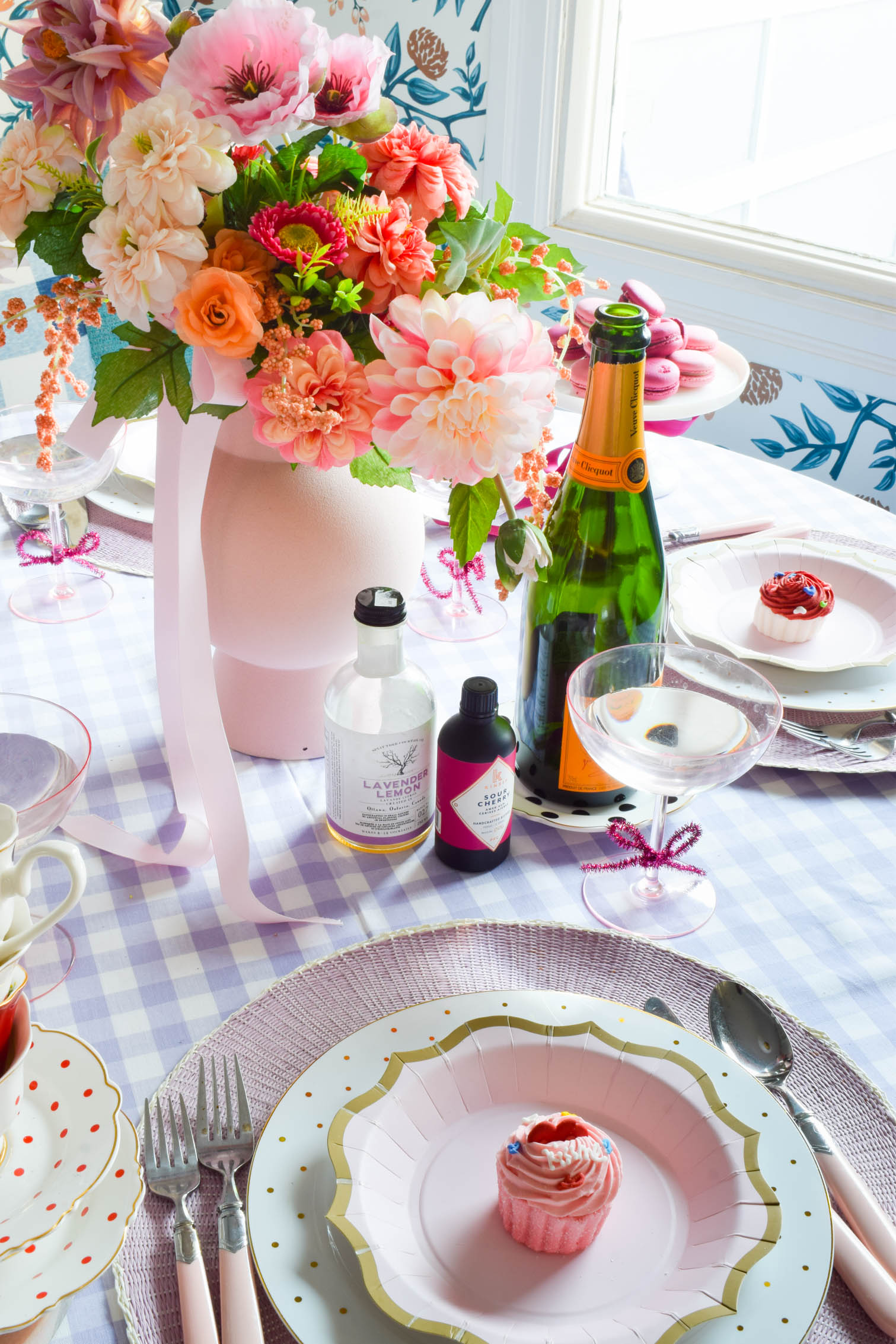 valentine's day table decor doesn't just have to be heart diecuts and cinnamon hearts. A soft purple tablescape, with shades of pink is all you need.