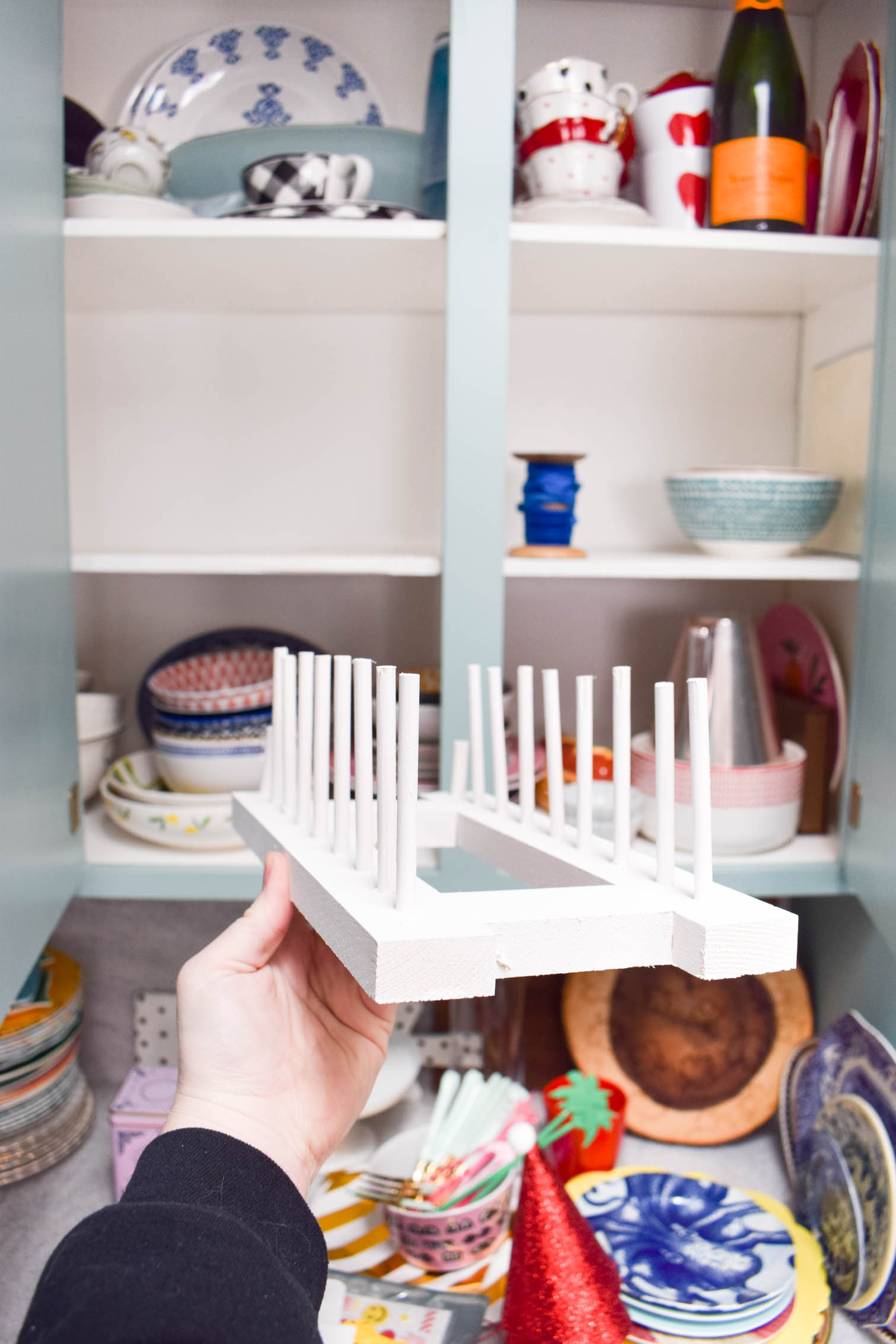 Make some DIY plate racks to organize all your kitchen dishes! You can make yours in a day using wood scraps