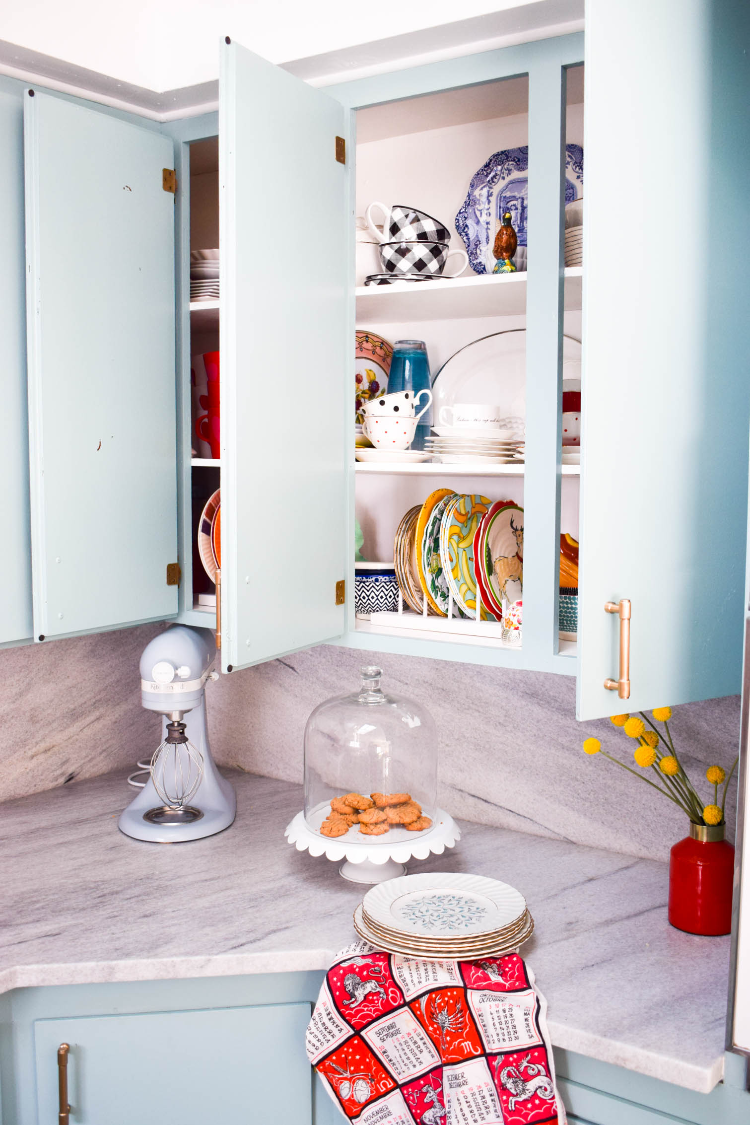 Make some DIY plate racks to organize all your kitchen dishes! You can make yours in a day using wood scraps