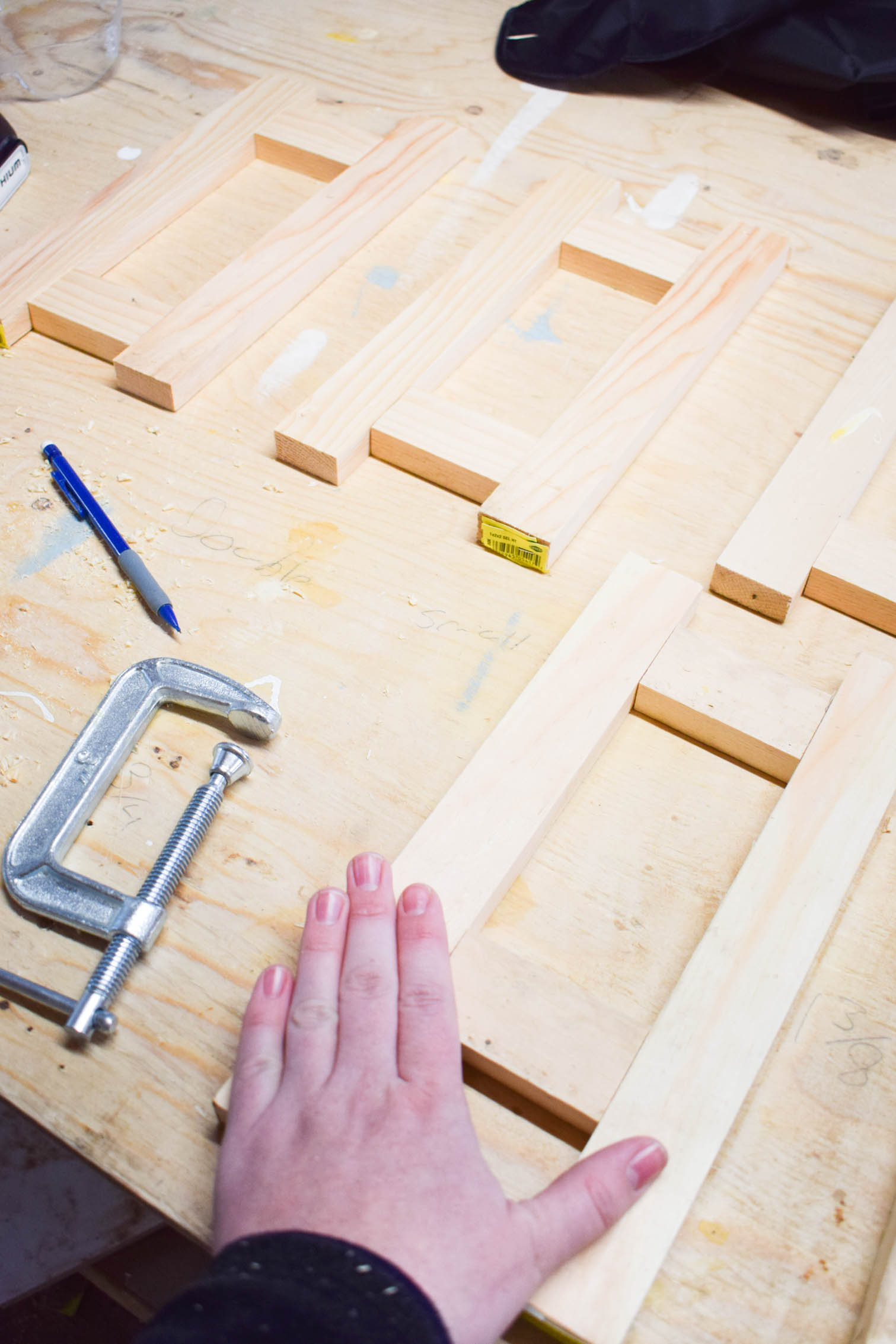 Make some DIY plate racks to organize all your kitchen dishes! You can make yours in a day using wood scraps