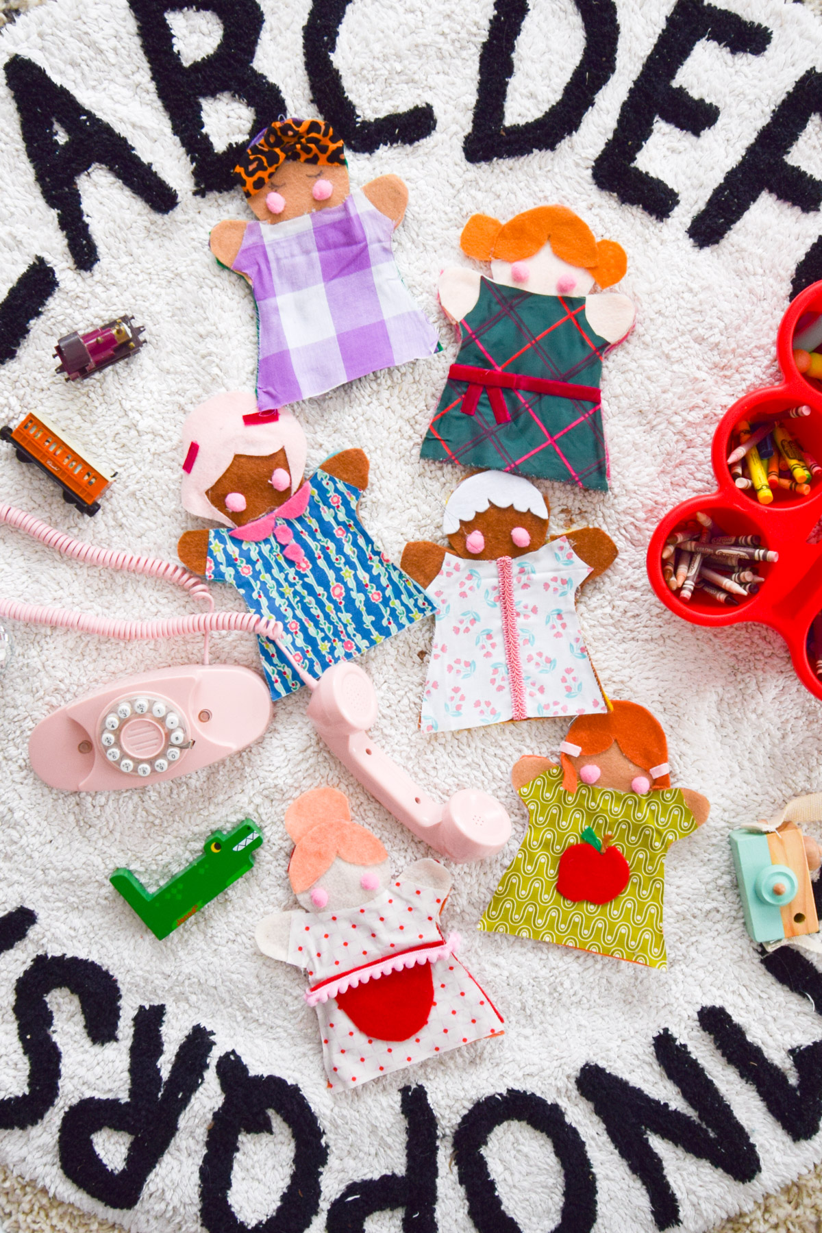 DIY Felt Hand Puppets that are racially inclusive and diverse are our latest Montessori project for June! Come see how I made them.