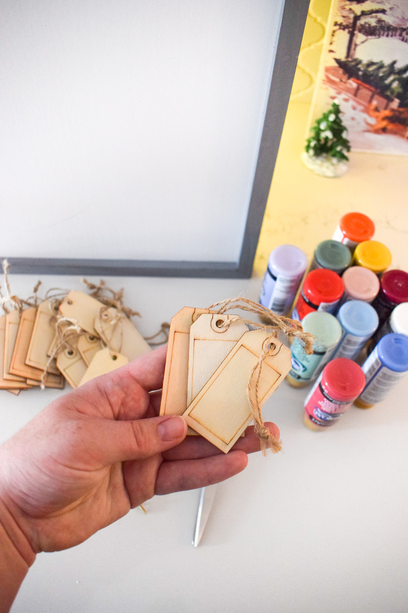 make a fun DIY reusable advent calendar that looks like all the fun and festive snow covered doors in your city or neighbourhood.